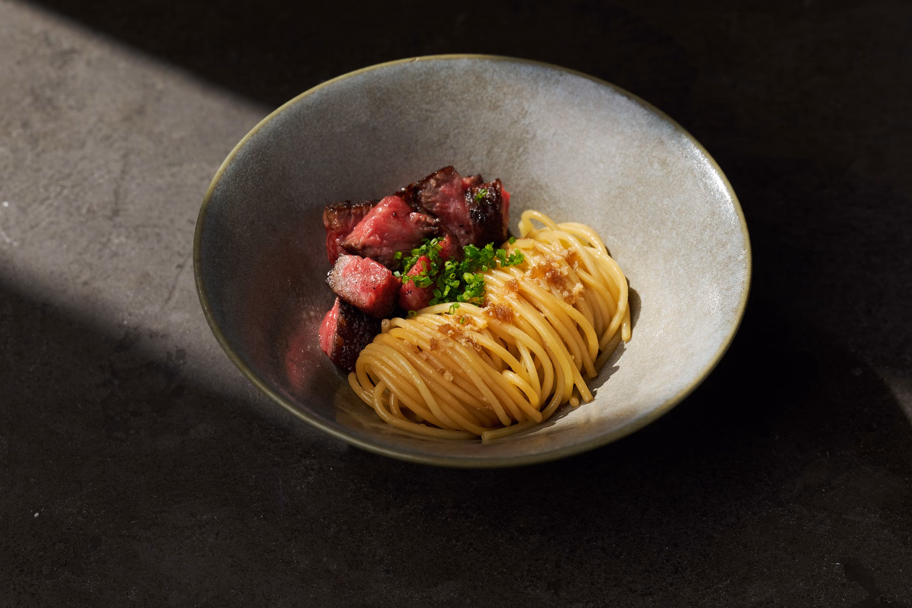"Diced wagyu with Arima sansho angel hair noodles" pairs grilled wagyu with sansho and thin noodles.