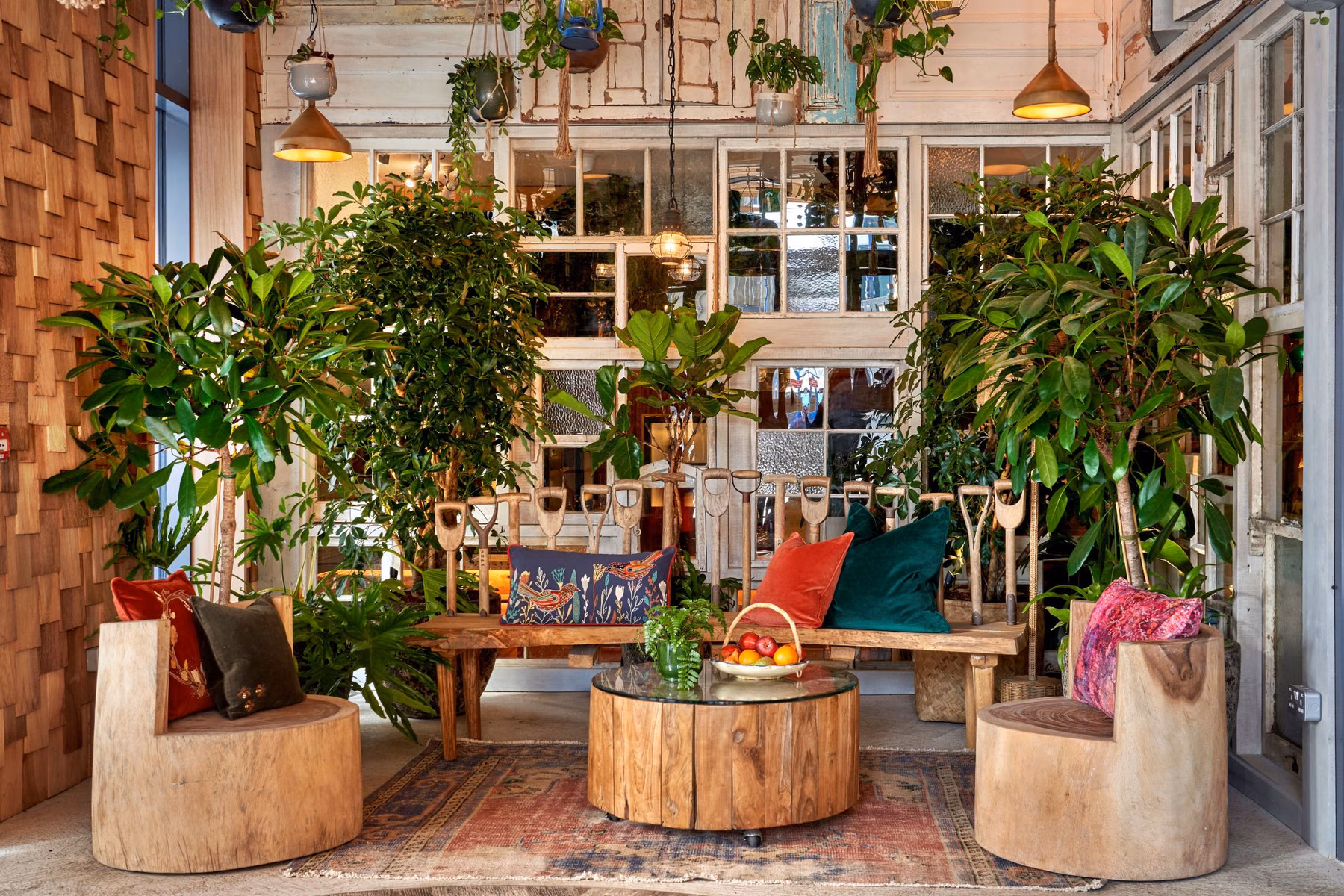 The entrance of Treehouse Hotel Manchester, marked by a timber facade and the Treehouse Hotel signage as a pocket of greenery in the city. Photo / Supplied by Treehouse Hotels