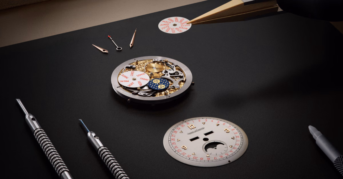 A disassembled dial and components offering another perspective on timepiece restoration.