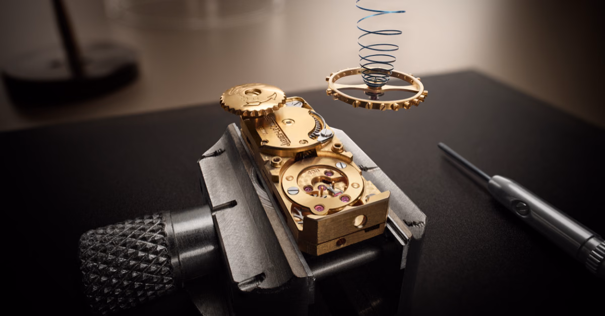 Vintage movement and components showcasing the intricate processes required for restoration.