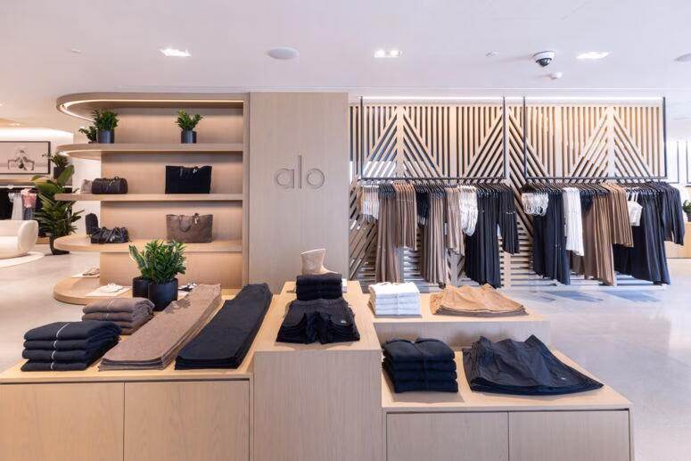 Clothes, handbags and footwear displayed together