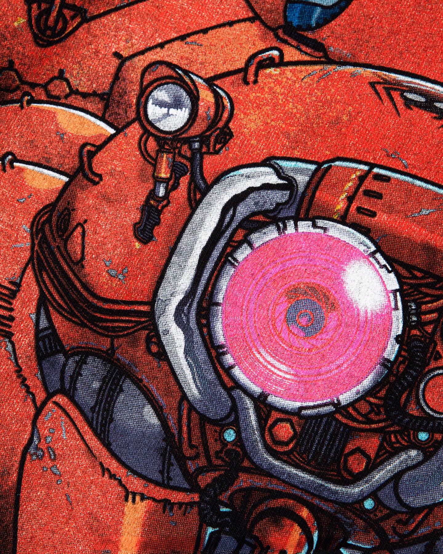 Close-up of the red mechanical print