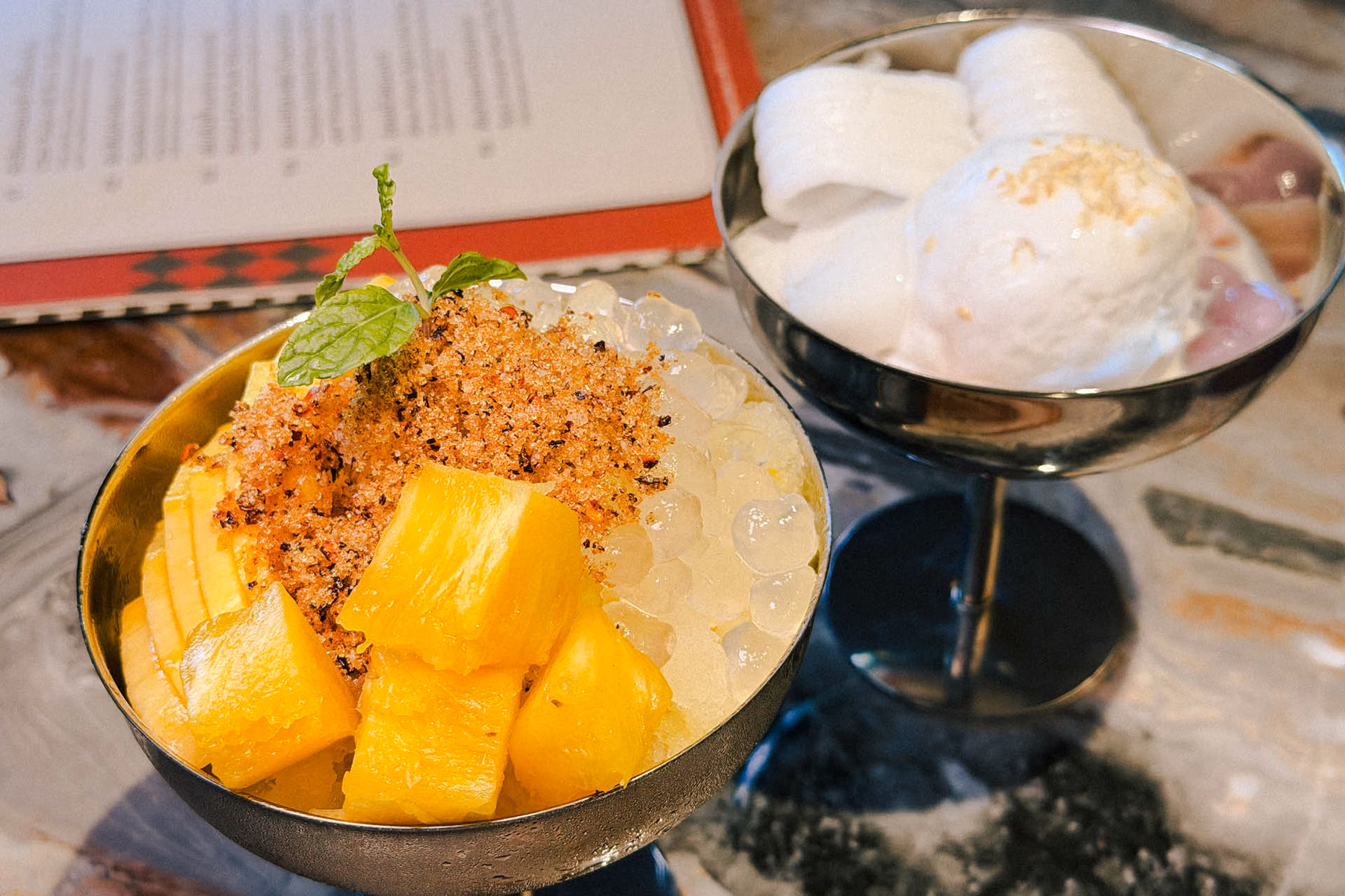 Citrus-fruit granita and coconut ice cream desserts