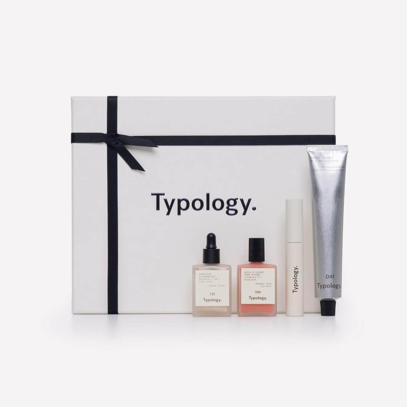 Typologyティントケアセットの保湿クリーム、スポイト瓶、リップオイル、マスカラ