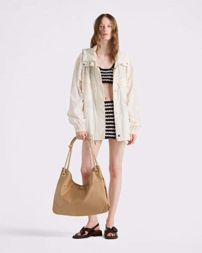 Light Prada Mariner bag styled with clothing