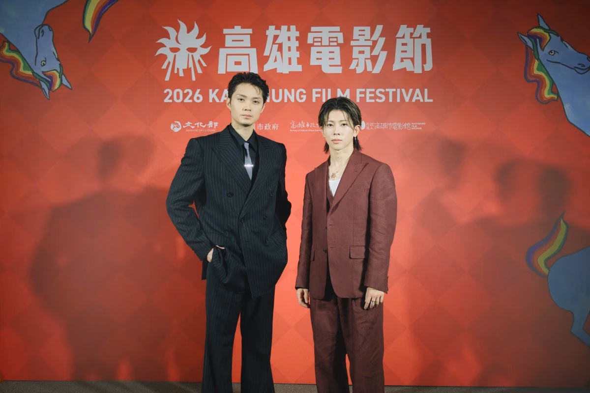 Hayato Isomura and Seiya Suezawa before the festival’s event backdrop
