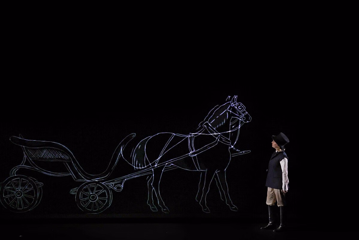 A performer beside a horse-and-carriage line image