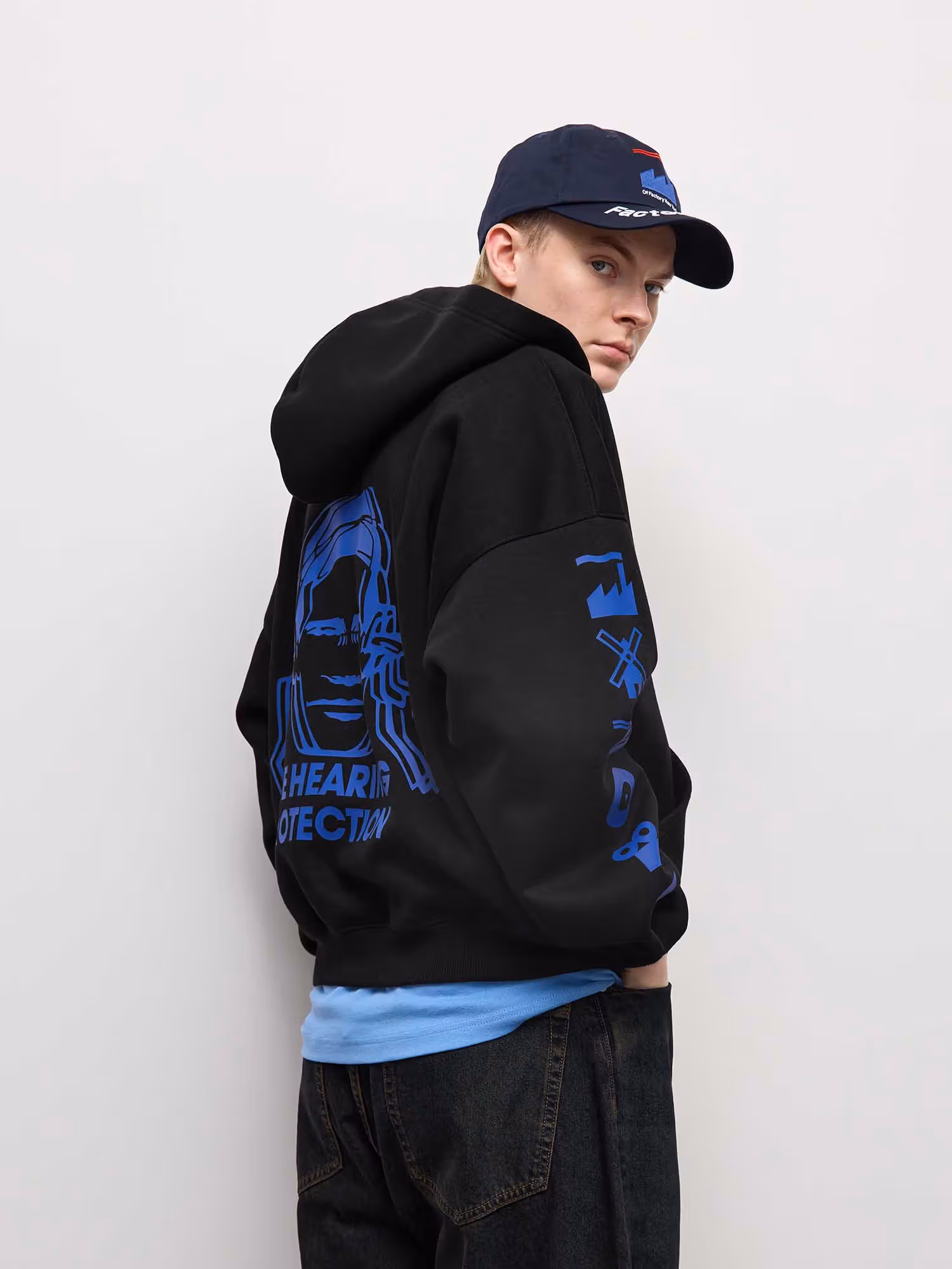 GU Reclaims Manchester's Legacy: Francesco Risso's Debut Collection Teams Up with Factory Records