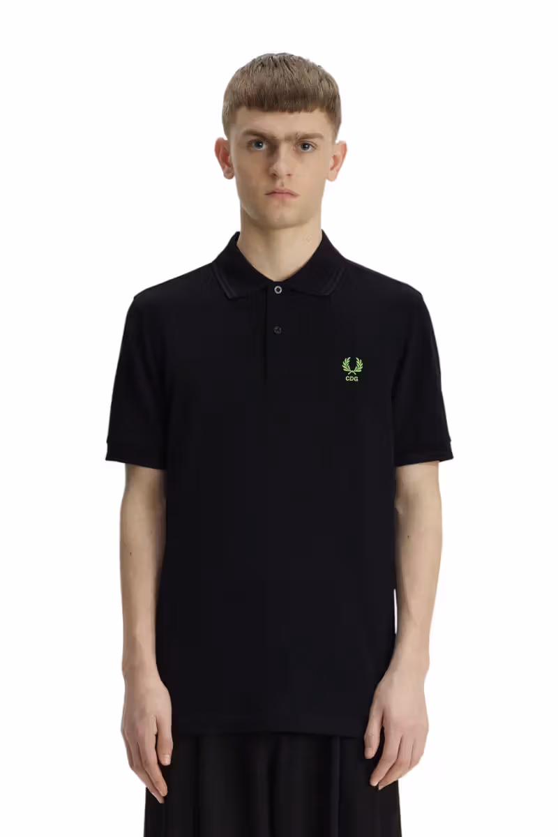 COMME des GARÇONS รีเมค Fred Perry Polo อีกครั้ง คราวนี้ยัดสีนีออนลงไปในลายปัก