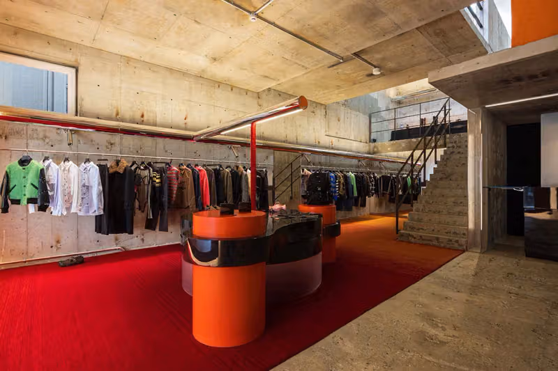 Andersson Bell Opens First Tokyo Flagship in 32-Year-Old Building, Pitting Raw Concrete Against Polished Metal